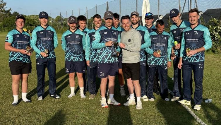 Bradley Flood and his winning Hook Black Diamonds team Bradley Flood and his winning Hook Black Diamonds team